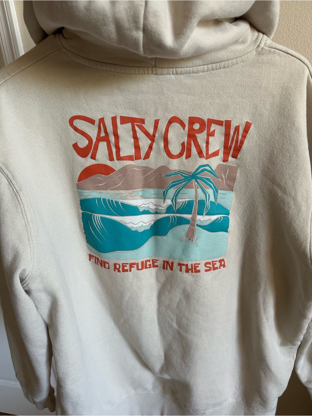 Salty Crew Cream Pullover Hoodie with Coral & Teal Logo